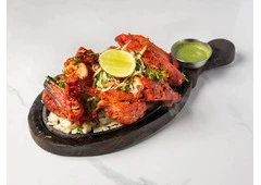 Explore Rich Flavors from the Tandoori Menu at Chopras Indian Restaurant Den Haag