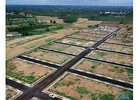   What are the benefits of buying a plot in Noida?